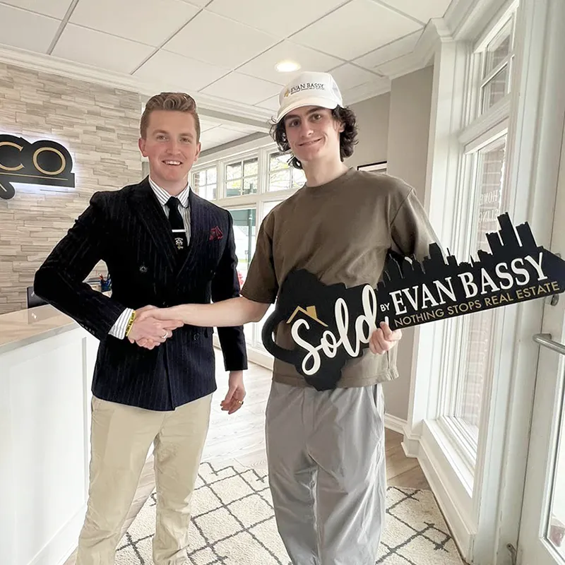 Evan Bassy closing a real estate deal in Michigan